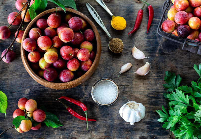 Bright red salted plums